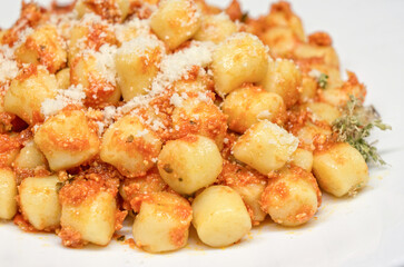Italian cooked gnocchi in white plate