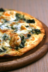 Homemade pizza with spinach and feta. Spinach Pie Vegetarian pizza