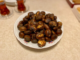 Chestnuts with Turkish Tea. Traditional Street Food.