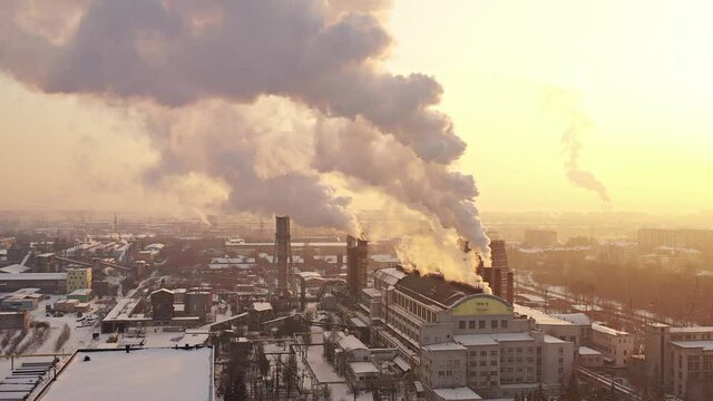 CHP, steam, pipes, smoke. Aerial photography.