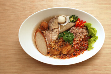spicy noodles with fish ball and minced pork (Tom Yum Noodles) - Asian food style