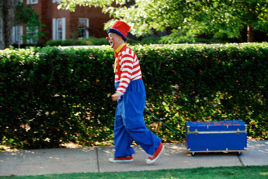 Clown pulling a wagon