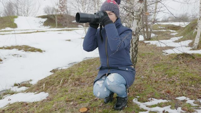 Woman photographer take pictures of nature