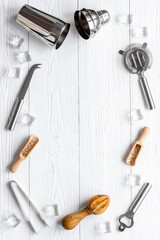 Top view of bar accessories with a cocktail shaker