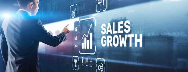 Sales Growth Man clicks inscription on virtual 3D screen.