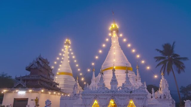 4K Time Lapse Video of Phra That Doi Kong Mu Temple is the sacred temple of Mae Hong Son province for a long time at night.