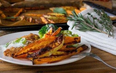 Sweet potato fries served as a side dish on a dinner plate