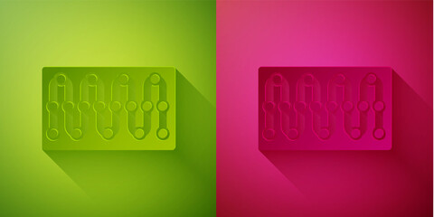 Paper cut Board game icon isolated on green and pink background. Paper art style. Vector.