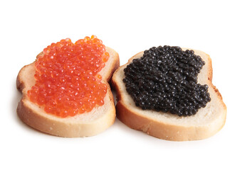 Red caviar lies on bread. Isolated object on a white background
