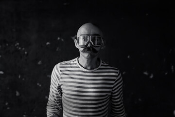 sexy macho with a mustache, freak, unusual portrait of a hipster guy