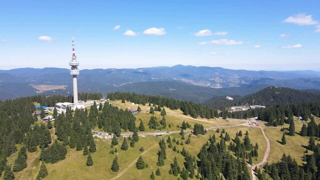 Aerial view of Rhodope Mountains and Snezhanka tower near resort of Pamporovo, Smolyan Region, Bulgaria