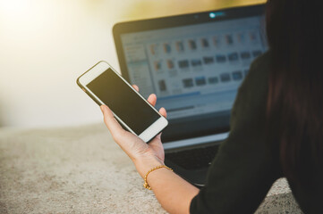 Hand use mobile phone or smartphone at work place