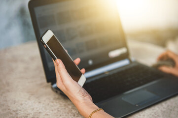 Hand use mobile phone or smartphone at work place