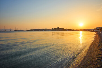 Panoramic Sunset view of Gumbet bay in Bodrum on Turkish Riviera. Bodrum is a district and a port...