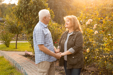 Beautiful senior couple in love outside, Valentines day