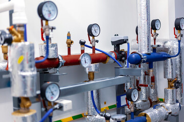 The modern heating system in boiler room. Heating unit for hot water supply, automatic regulation...