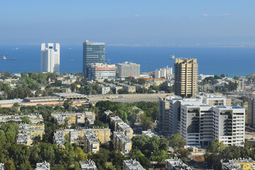 Fototapeta premium view of the districts lower town Haifa, in the background, the Rambam hospital building and the Gulf of Haifa, Israel