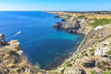 Cape Fiolent. Beautiful views of the Black Sea coast at Cape Fiolent in summer in clear weather. Aerial view to beautiful sea coast with turquoise water and rocks
