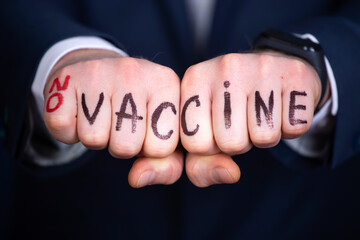 A anti vax or anti vaccine protests against the new covid-19 vaccine