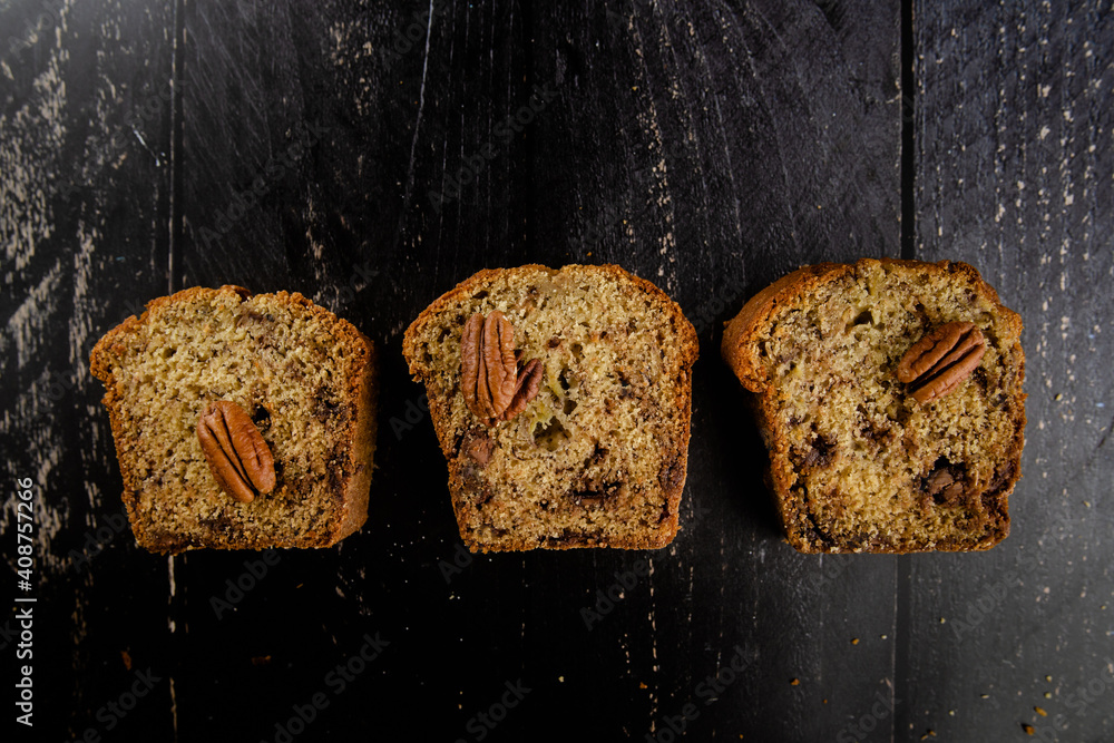 Wall mural Homemade banana bread with chocolate chips and walnuts