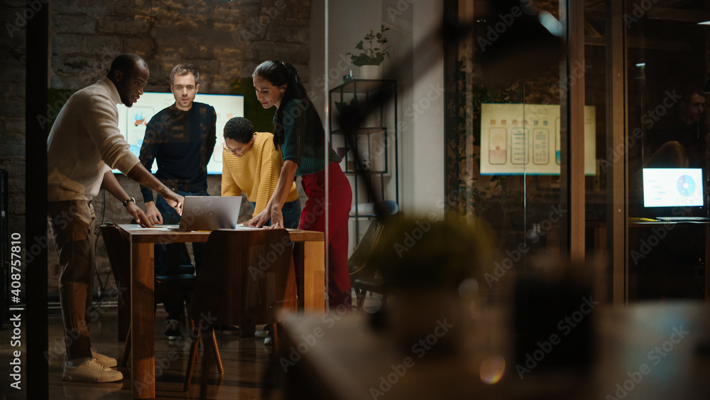 Poster Diverse Multiethnic Team are Having a Conversation in a Meeting Room Behind Glass Walls in a Creative Office. Colleagues Lean On a Conference Table and Discuss Business, App User Interface and Design.
