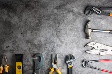 Construction tools on Gray-black cement floor background with copy space.Home Repair concept, Repair maintenance concept, Renovation concept. - 408758211