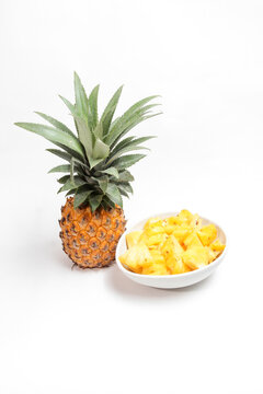 Honey pineapple fruit (Nanas Madu) with the Latin name Ananas Comosus on white background. isolated