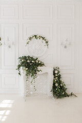 luxury delicate interior of the living room and bedroom in light colors with expensive chic carved furniture in classic style