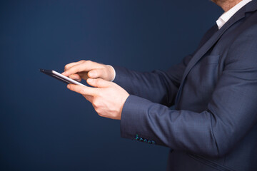 Businessman using tablet, double exposure with network