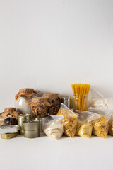 Home food supplies, necessary food for the period of quarantine and isolation, the concept of stay at home, canned food and cereals, various pasta and flour, sugar and honey and coffee