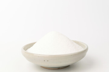 White sugar on white background