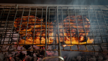Chicken bbq preparation on the charcoal grill. Bbq food