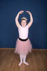 Balerina dancer girl on blue background © erika8213