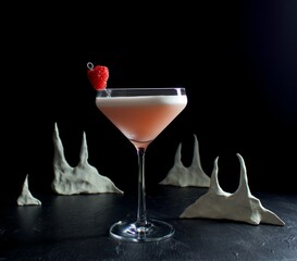 Pink Clover Club cocktail against a black background