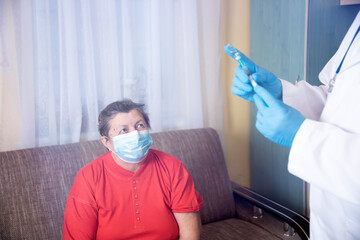 Fototapeta na wymiar Elderly woman getting coronavirus vaccine