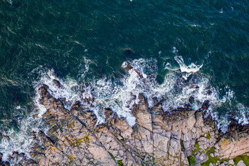 Drone View of rocky cliff coast on Bornholm, Denmark - obrazy, fototapety, plakaty