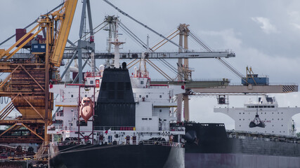 SEAPORT - Merchant ships unloaded at transhipment quays

