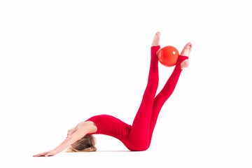 gymnast girl in a red jumpsuit does an exercise with ball on white background, isolate.