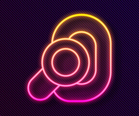 Glowing neon line Hearing aid icon isolated on black background. Hearing and ear. Vector.