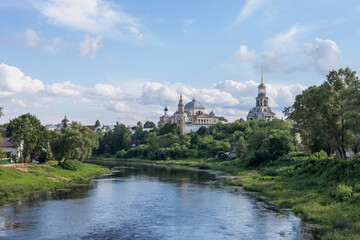 Fototapeta na wymiar Ancient Russian city with churches on the river bank