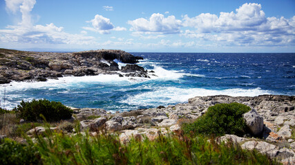 Fototapeta na wymiar waves on rocks, Tremiti archipelago. San Domino island. Apulia, Italy