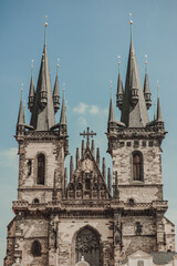 PRAGUE, CZECH REPUBLIC - July 28, 2013: Church of our lady of tyn on blue sky background with clouds.