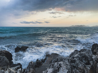 Dark rainy clouds at the sea