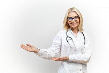 A charming female doctor pediatric, physician, therapist wearing a white medical gown with a...