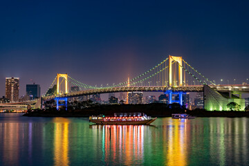Rainbow bridge at twilight in Tokyo, Japan