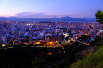 Sunset in alicante city, beautiful views from the santa barbara castle towards the neighborhoods