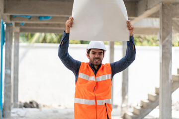 Male foreman holding a sign to protest against a construction company. 