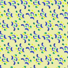 Seamless fabric with blue, yellow and green spots on a yellow background.