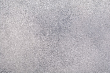 fine grained texture of the concrete surface painted in light gray color