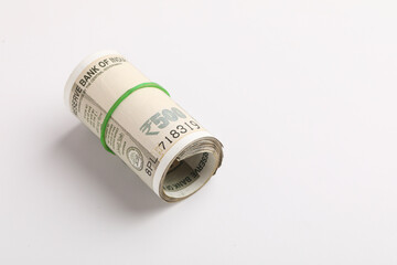A stack of five hundred rupee notes (Indian currency) isolated on a white background.